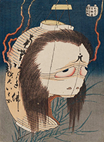 Oiwa-san (her face is merging with a festival lantern that is burning